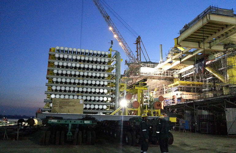 Professional marine consultancy services conducting marine equipment and asset inspection at night.