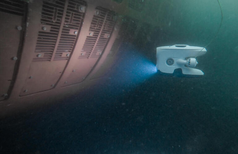 Underwater drone inspection inside ship hull structure