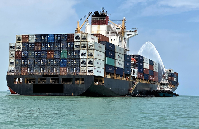 P&I Malaysia insurance protection for container vessel navigating international waters.