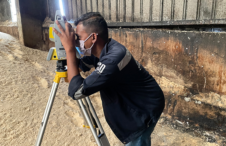 Technical analysis and surveying of an industrial stockpile to ensure accurate inventory.