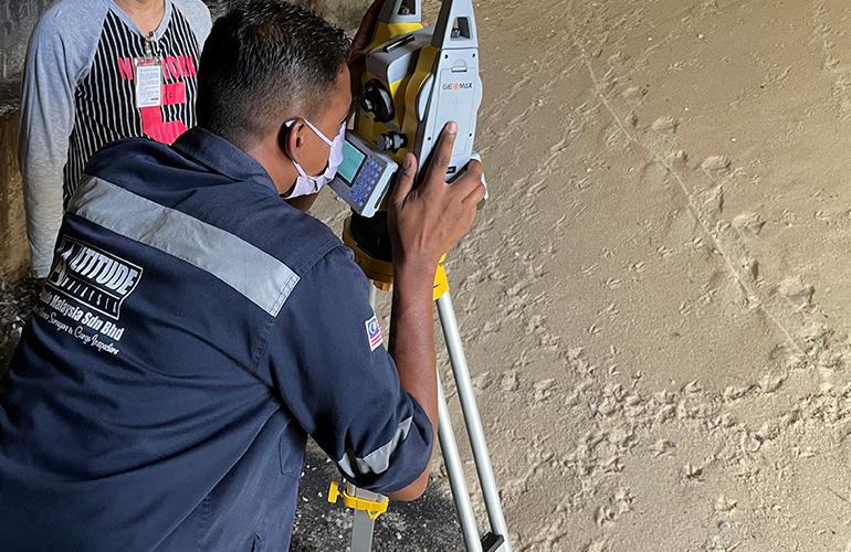 Close-up of professional equipment used to conduct a stockpile volume survey.